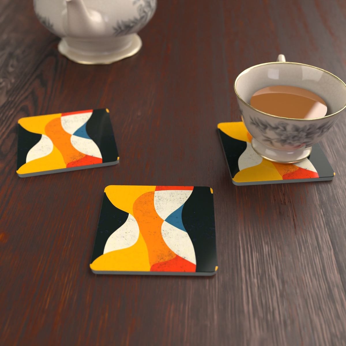 Mid-Century Abstract Shapes Square Glass Coasters – Set of 6 – lifestyle mockup with a teacup