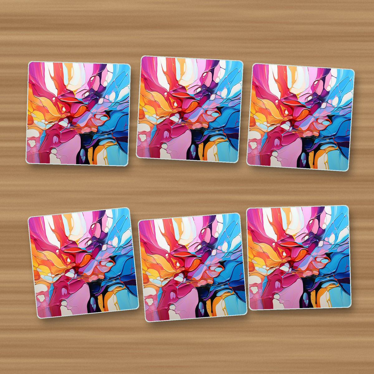 Colour Burst Fluid Art square glass coasters, set of 6, on an oak coffee table