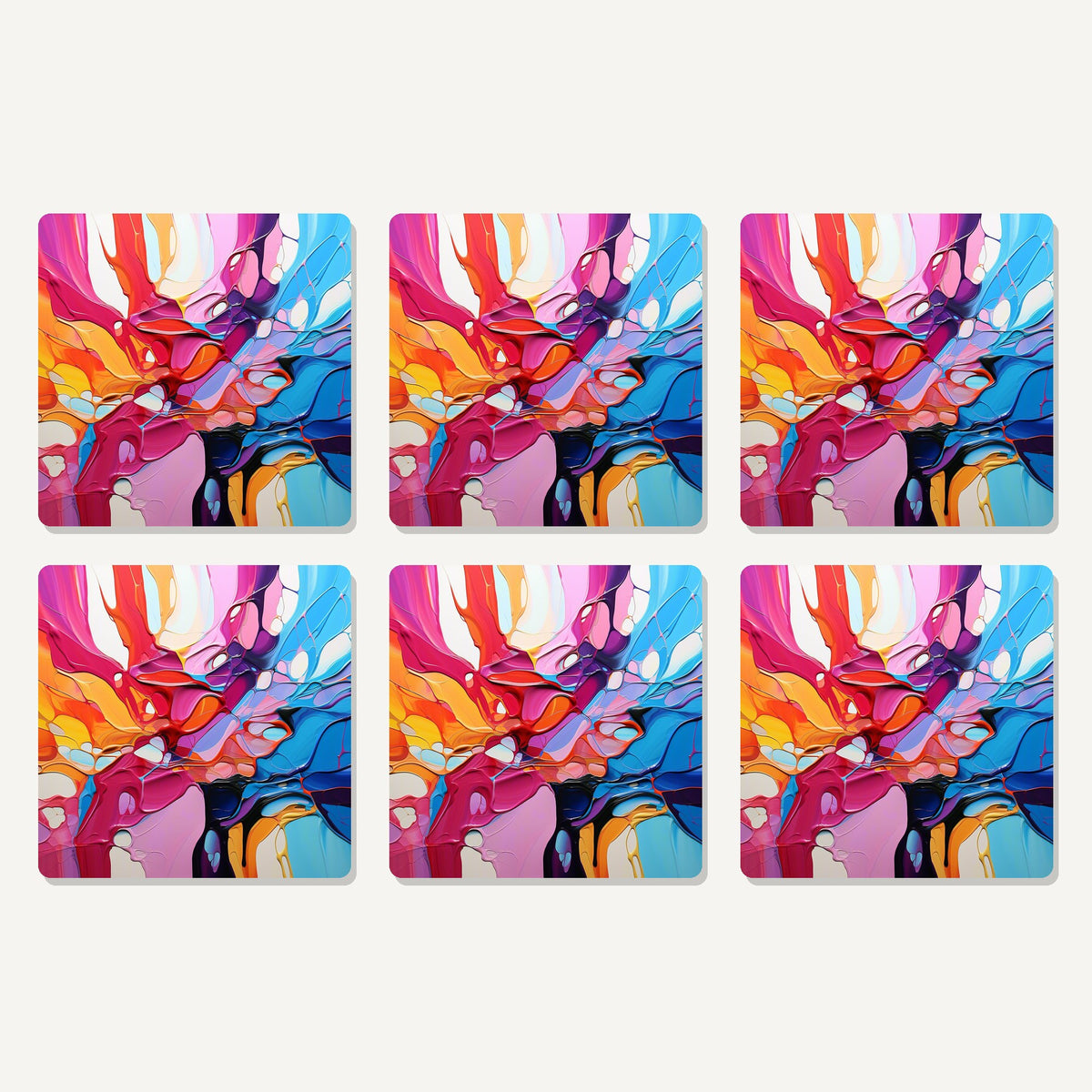 Flat lay of the colour burst fluid art artwork on six square coasters