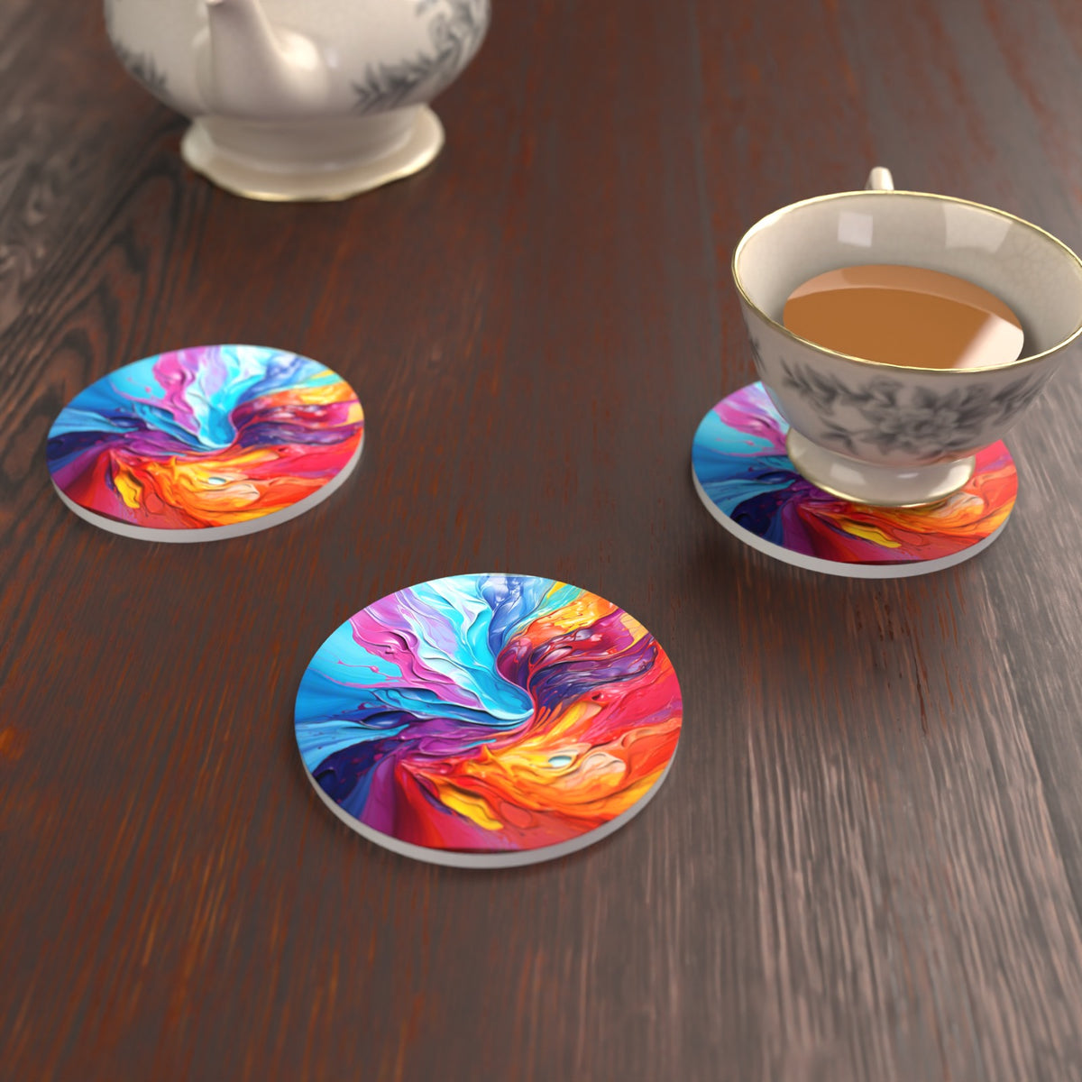 Rainbow Paint Swirl Round Ceramic Coasters – Set of 6 – lifestyle mockup with a teacup