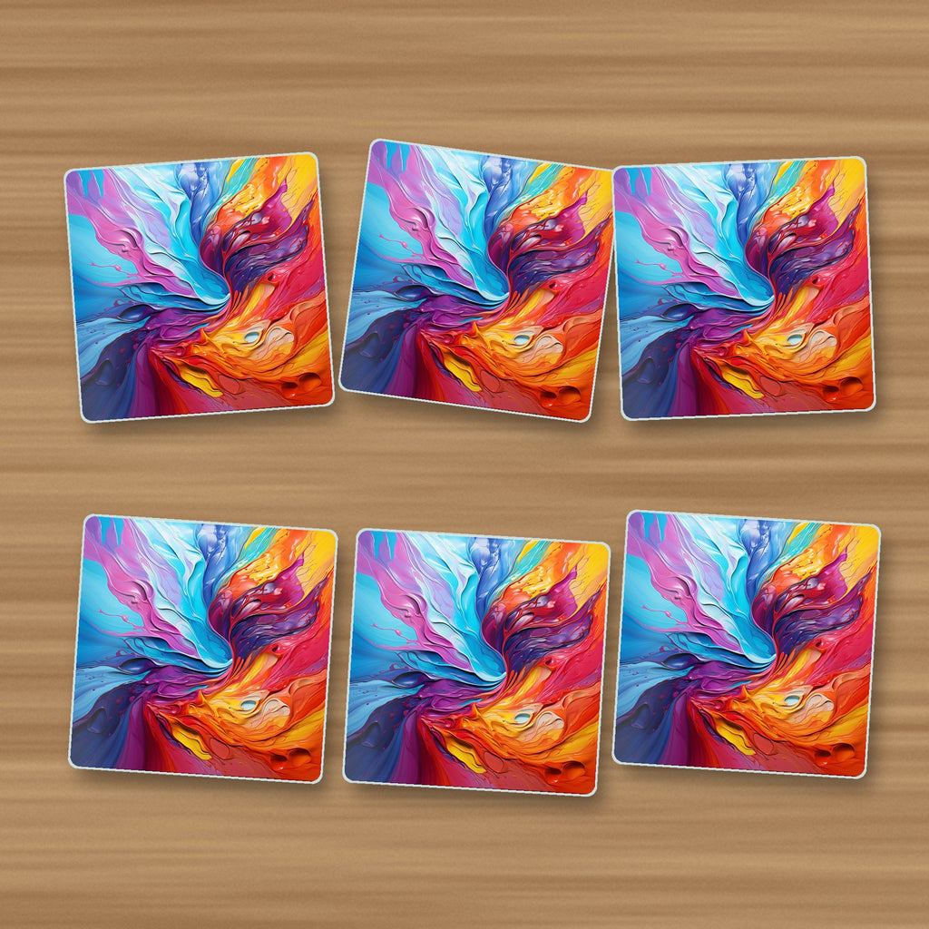 Rainbow Paint Swirl square glass coasters, set of 6, on an oak coffee table