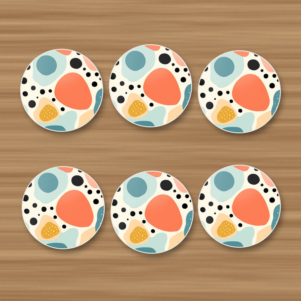 Boho Blobs & Dots round ceramic coasters, set of 6, on an oak coffee table