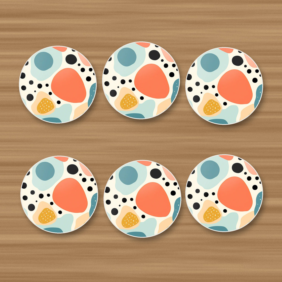 Boho Blobs & Dots round ceramic coasters, set of 6, on an oak coffee table