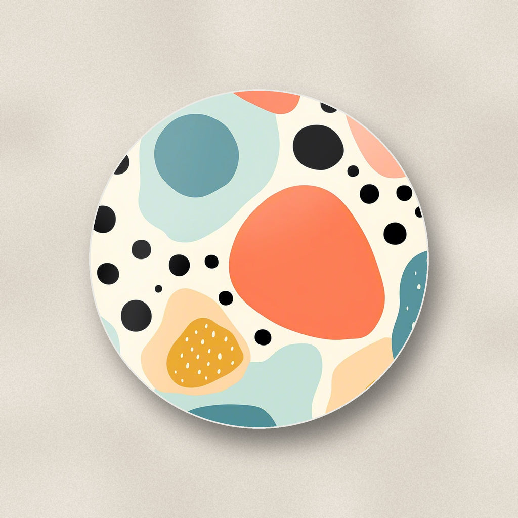 Close-up of one boho blobs & dots round ceramic coaster, flat UV print