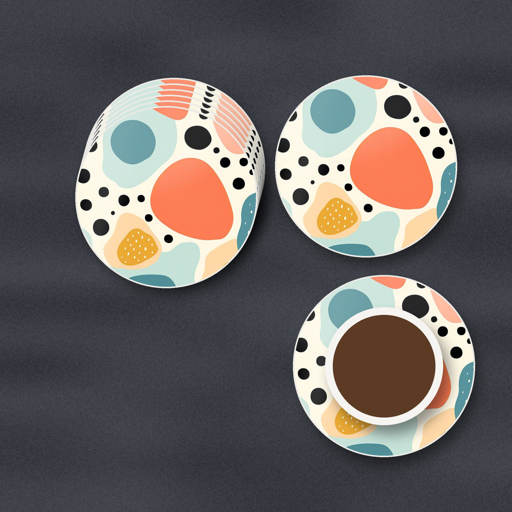 Boho Blobs & Dots round ceramic coasters stacked on a slate kitchen worktop