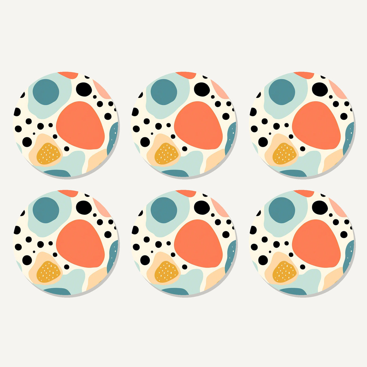 Flat lay of the boho blobs & dots artwork on six round coasters