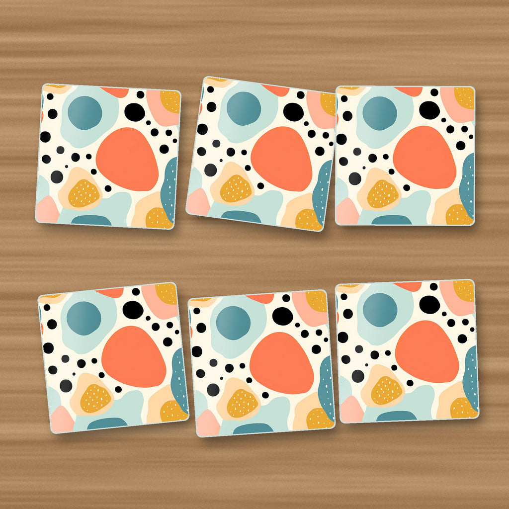 Boho Blobs & Dots square glass coasters, set of 6, on an oak coffee table