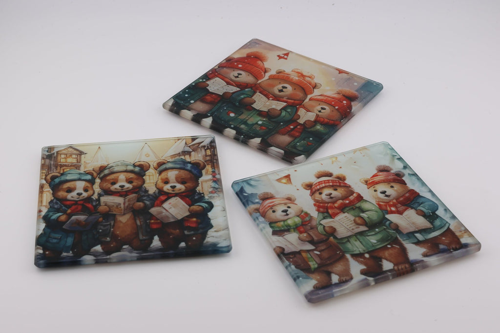 Christmas Carolling Bears glass coasters, photo of finished coasters