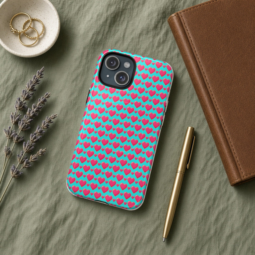 Heart Bubble Grid magnetic iPhone case flat lay on sage linen with a notebook and pen