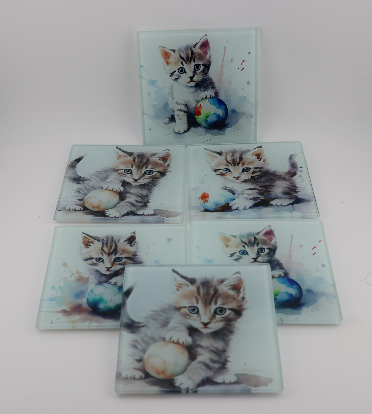 Watercolour Kitten in a Basket square glass coasters, photo of a finished set