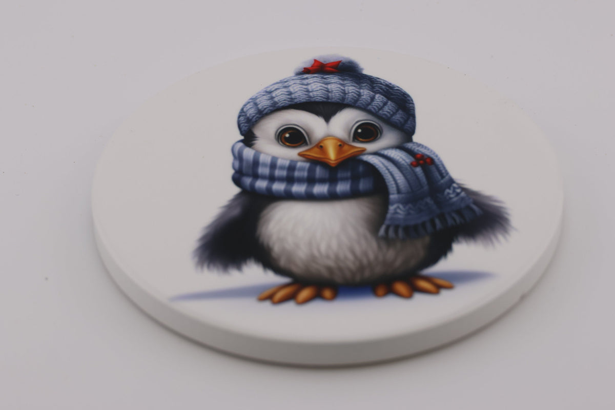 Christmas Penguin in Blue Scarf round ceramic coasters, photo of a finished set