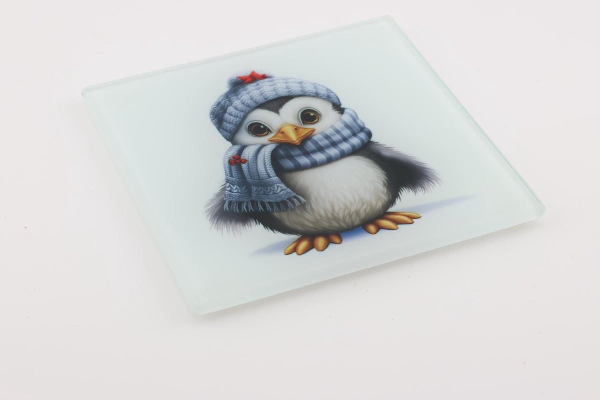 Christmas Penguin in Blue Scarf square glass coasters, photo of a finished set