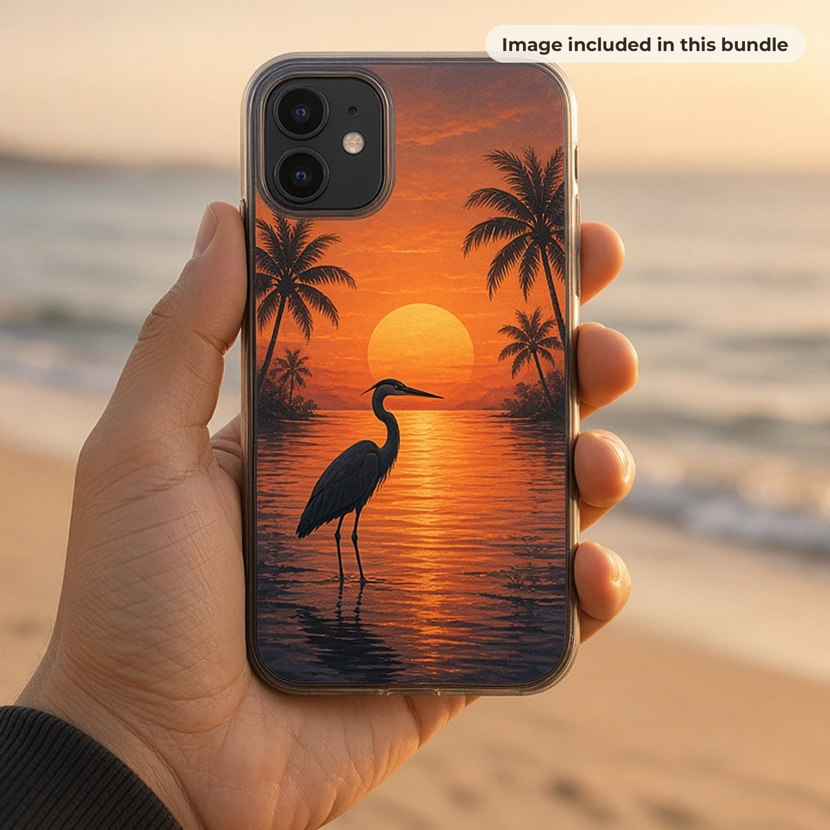 Landscape & Beach Art Collection: Hand holding a phone case printed with a heron and palm trees against an orange sunset, on a beach at golden hour (image from this bundle)