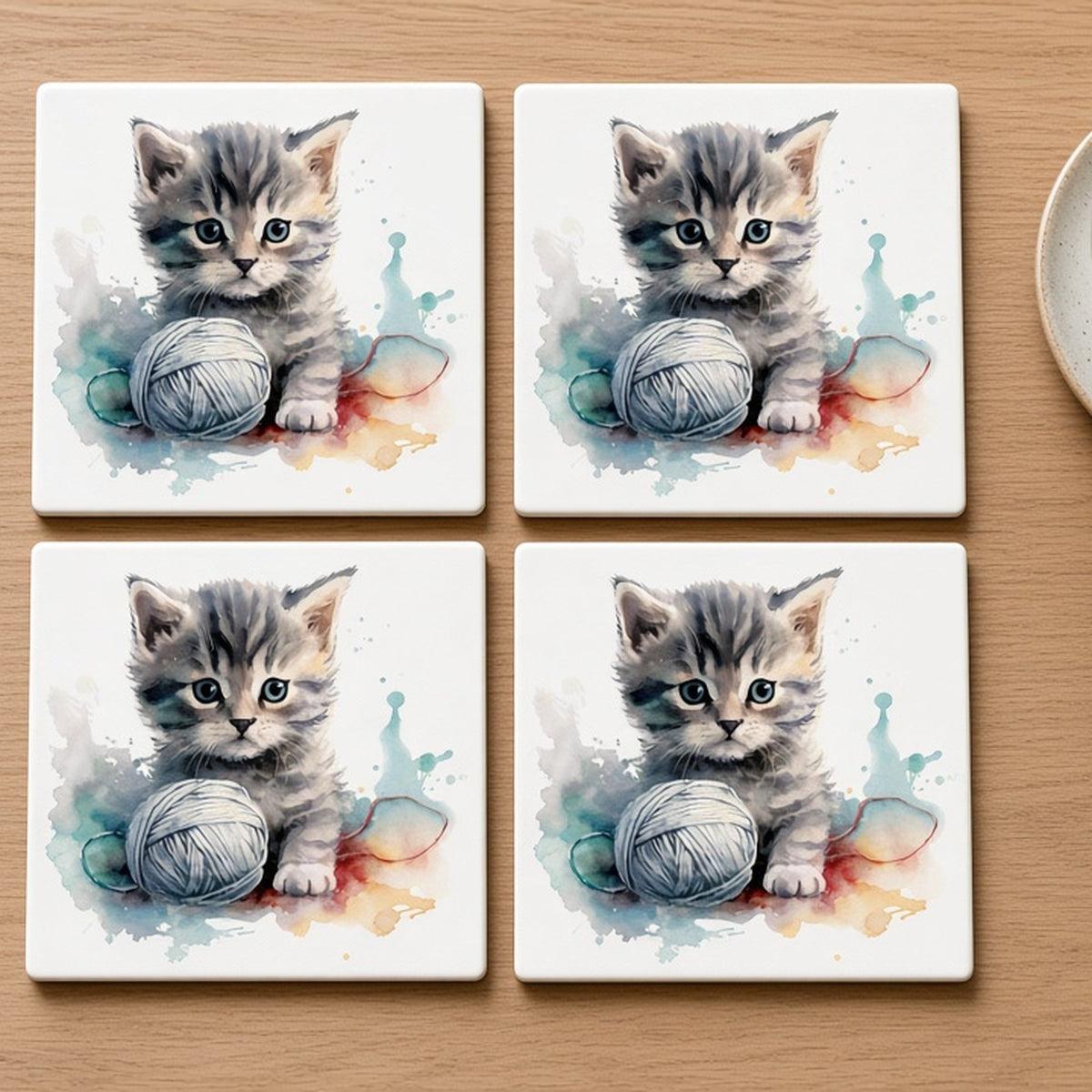 Watercolour tabby kitten with yarn from the bundle printed flat on a set of four coasters, image 0228