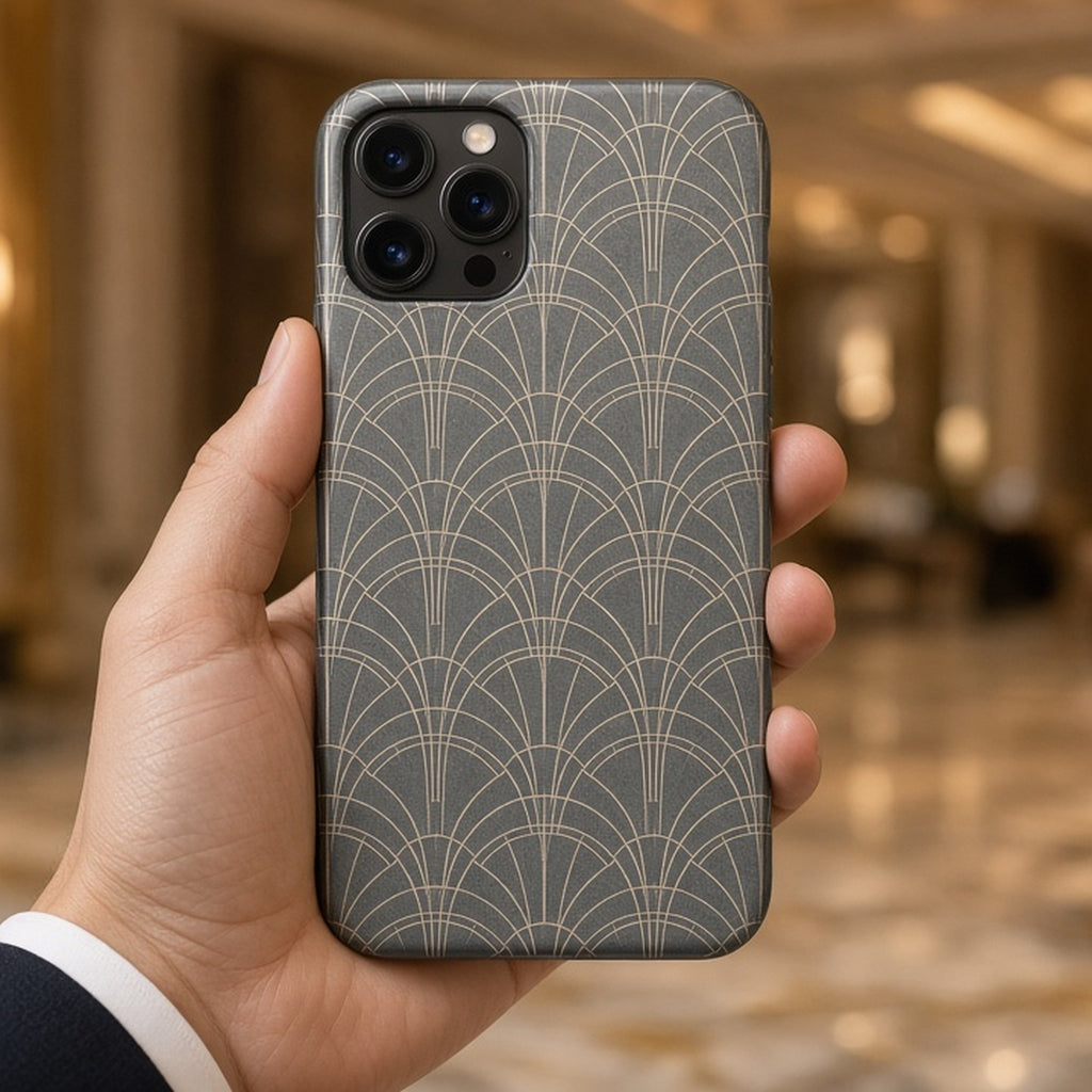 Slate Art Deco fan geometry pattern printed flat on a phone case held in a hotel lobby, made with prompt #25