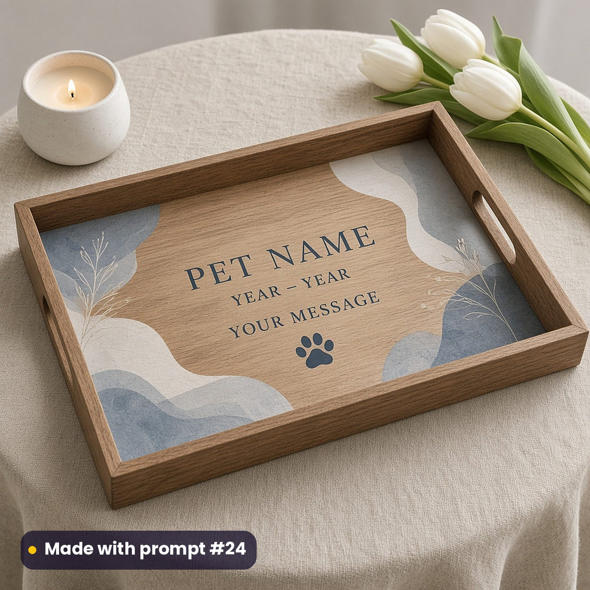 Wooden tray printed with soft dusty blue organic shapes, a paw print and PET NAME, YEAR – YEAR and YOUR MESSAGE placeholder text, beside a candle and white tulips, made with prompt #24