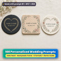 Three personalised wedding coasters on ivory linen: a slate coaster with a gold laurel heart, a beech coaster with a watercolour floral frame and a ceramic coaster with a gilded botanical heart, each reading NAME & NAME and DD.MM.YYYY as placeholder text, made with prompt #1 + #57 + #22