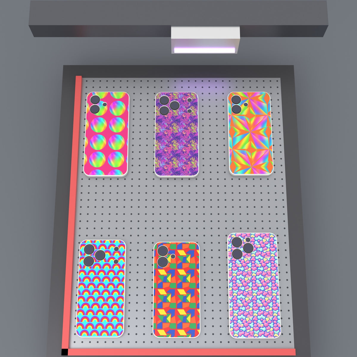 UV printed (back panel only): six phone case backs laid out on a UV flatbed printer bed, artwork printed on the back panel with the camera cut-outs left clear.