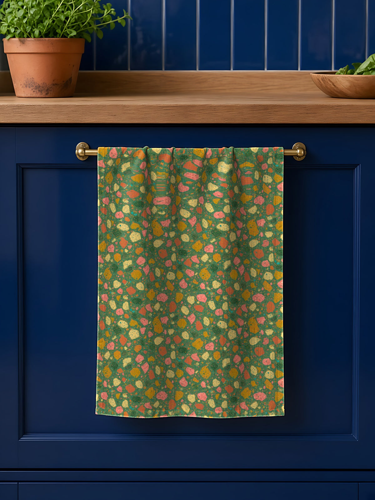 Macro Chip Mix in Forest Terrazzo palette on a tea towel, example use of Terrazzo Pop Seamless Pattern Prompt Pack