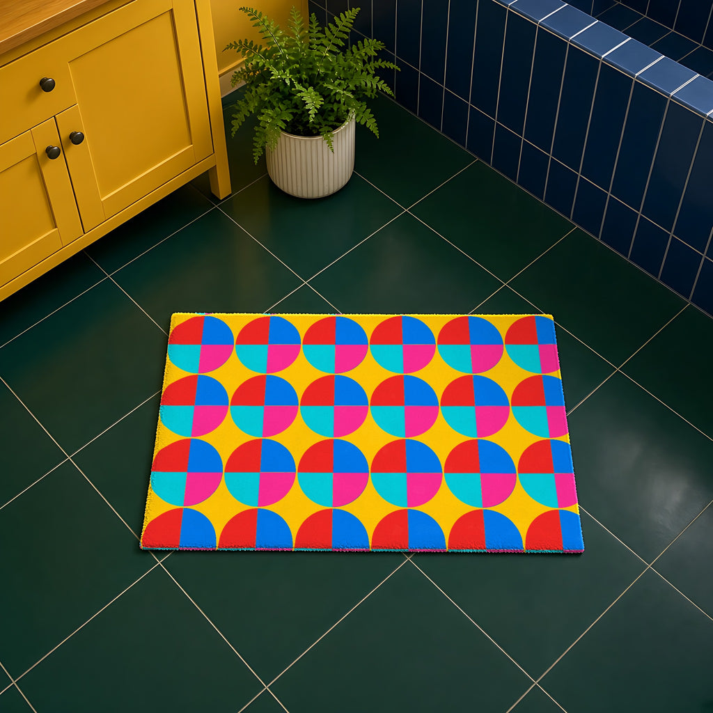 Wedge Wheel Blocks in Neo Bauhaus Brights palette on a bath mat, example use of Neo Bauhaus & Cubist Brights Seamless Pattern Prompt Pack
