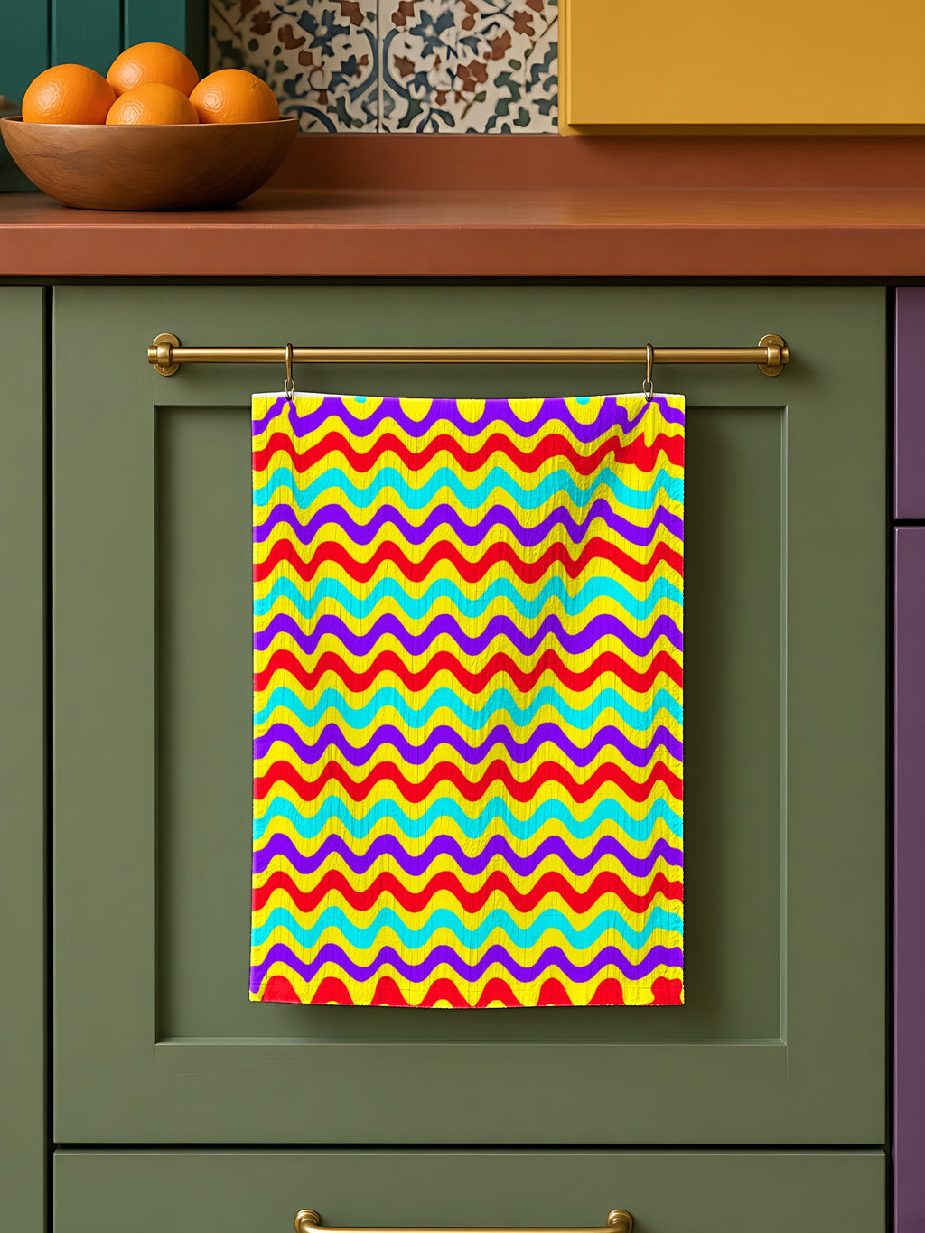Big Ripple Chevrons in Chromatic Ripple palette on a tea towel, example use of the Free Seamless Pattern Prompt Sample