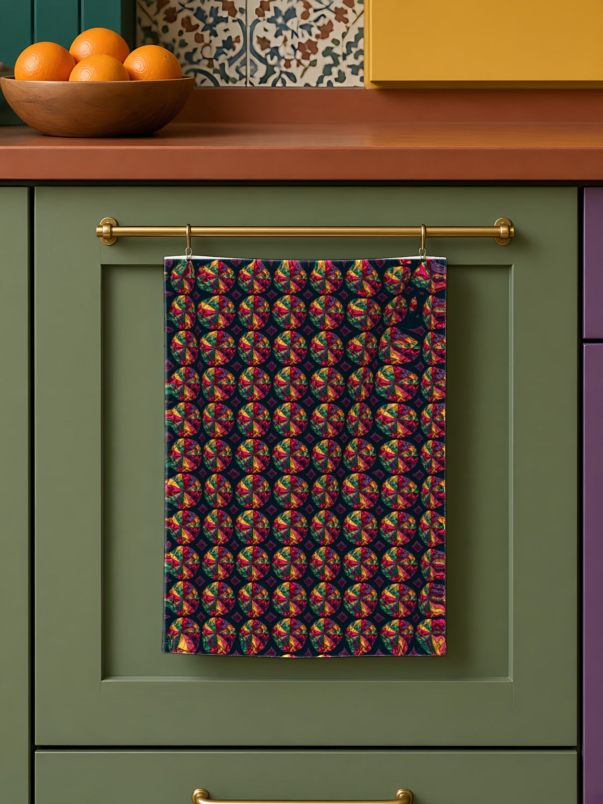 Kaleido Jewel Wheels in Plum & Gold palette on a tea towel, example use of Midnight Jewel Luxe Seamless Pattern Prompt Pack