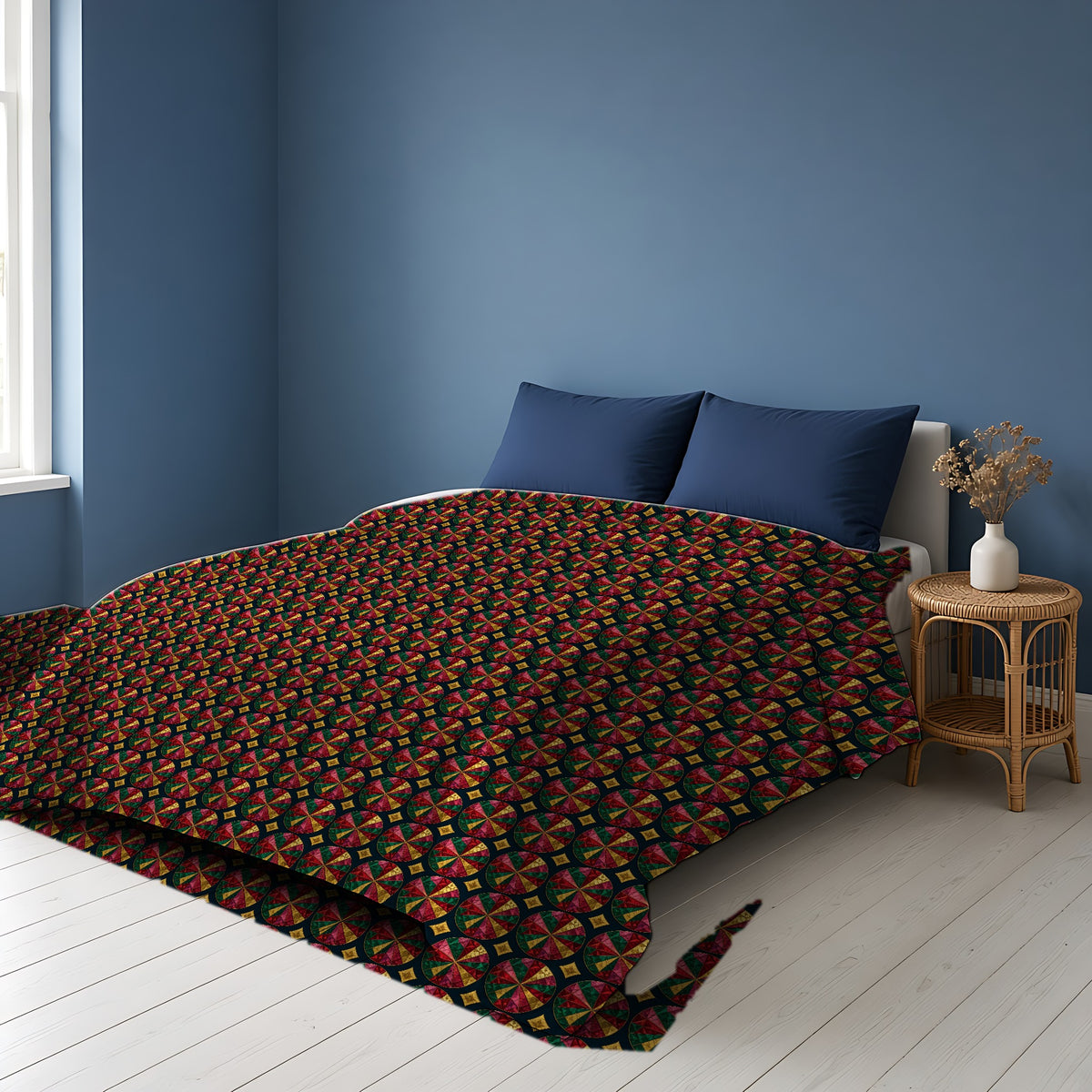Kaleido Jewel Wheels Comforter on a bed in a Scandinavian blue bedroom