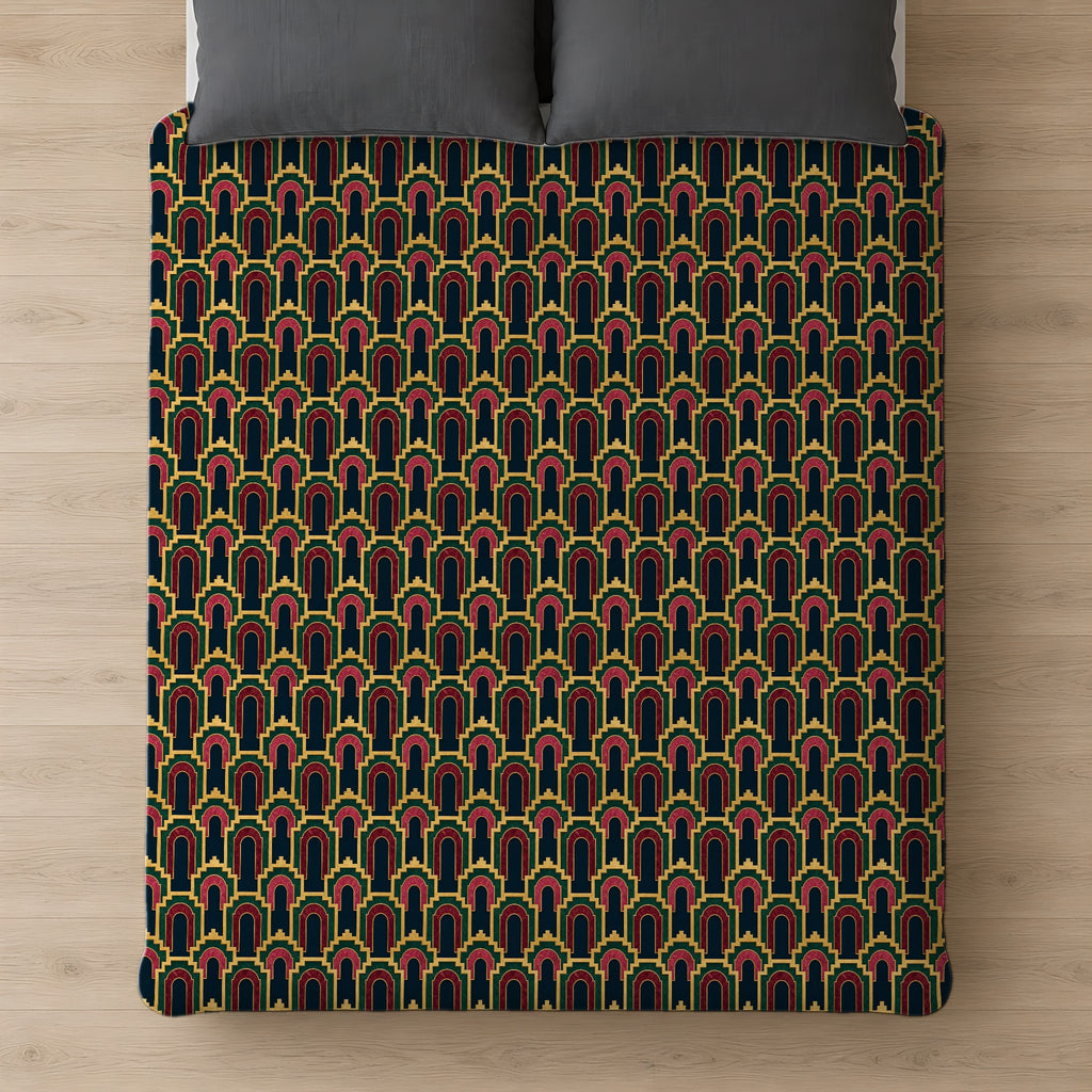 Stepped Gold Arches Comforter on a bed, seen from above