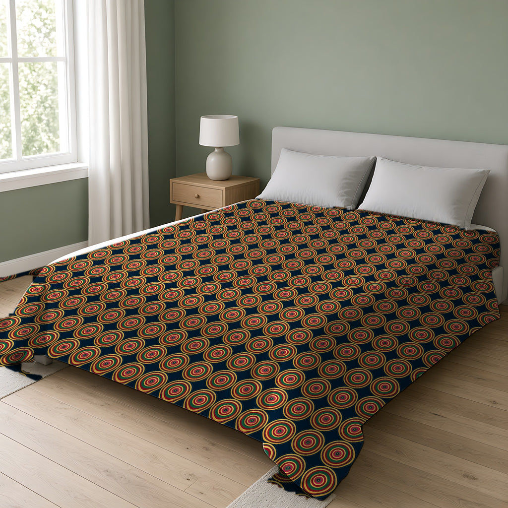 Op-Art Jewel Rings Comforter on a double bed in a bright sage-green bedroom