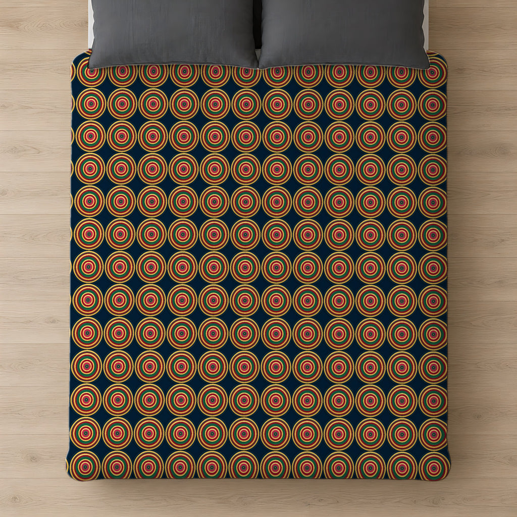 Op-Art Jewel Rings Cotton Duvet Cover on a bed, seen from above