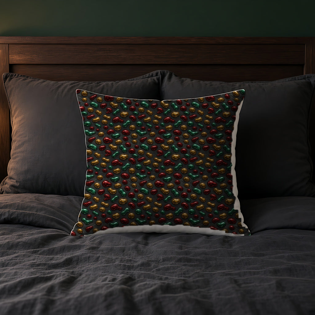 Garnet Emerald Blobs Faux Suede Cushion on a bed with charcoal bedding