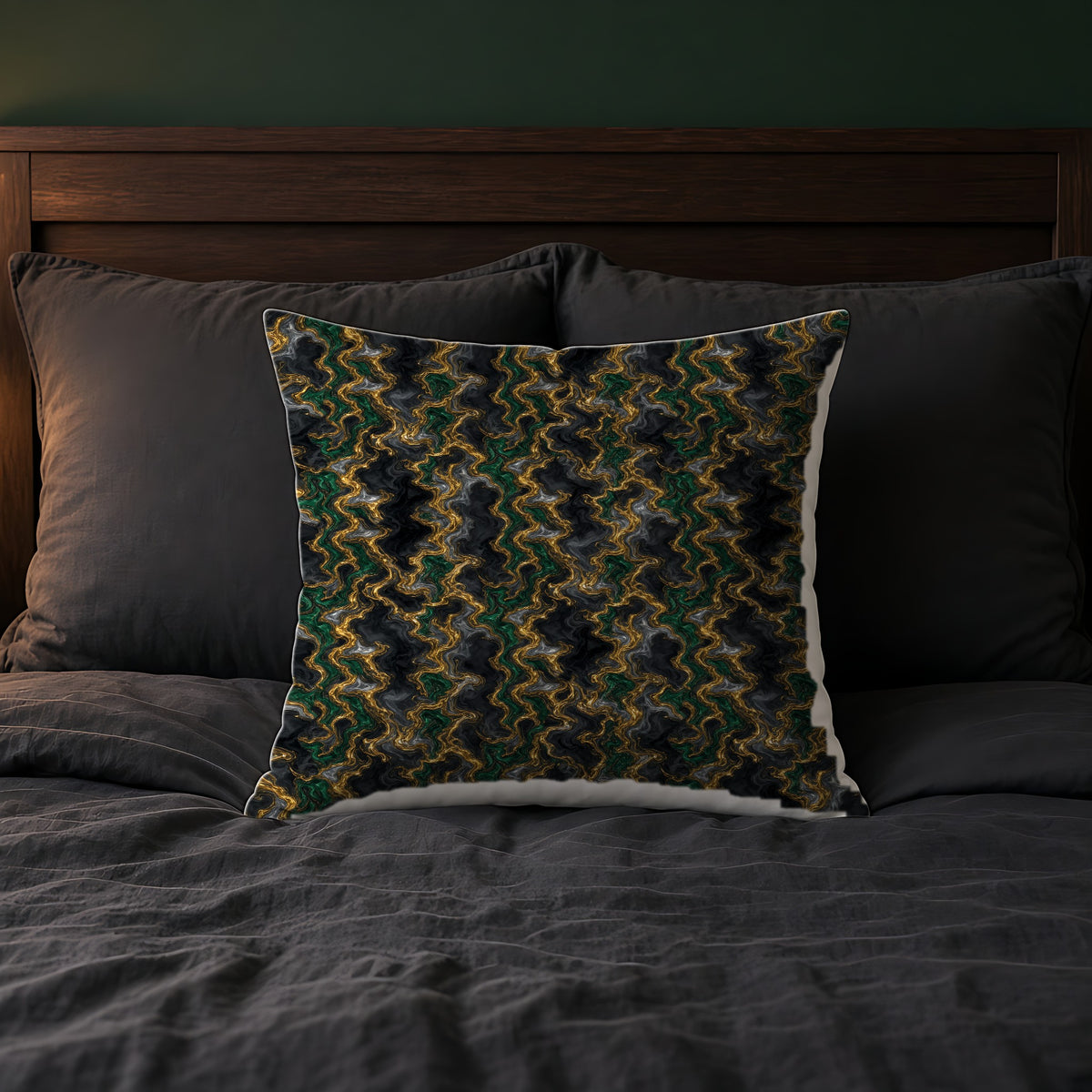 Molten Gold Marble Faux Suede Cushion on a bed with charcoal bedding