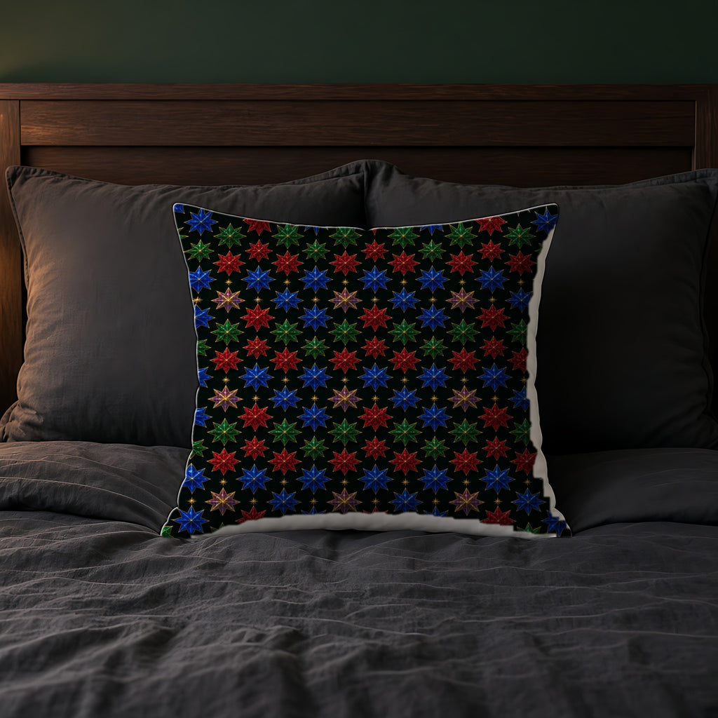Faceted Crystal Stars Faux Suede Cushion on a bed with charcoal bedding