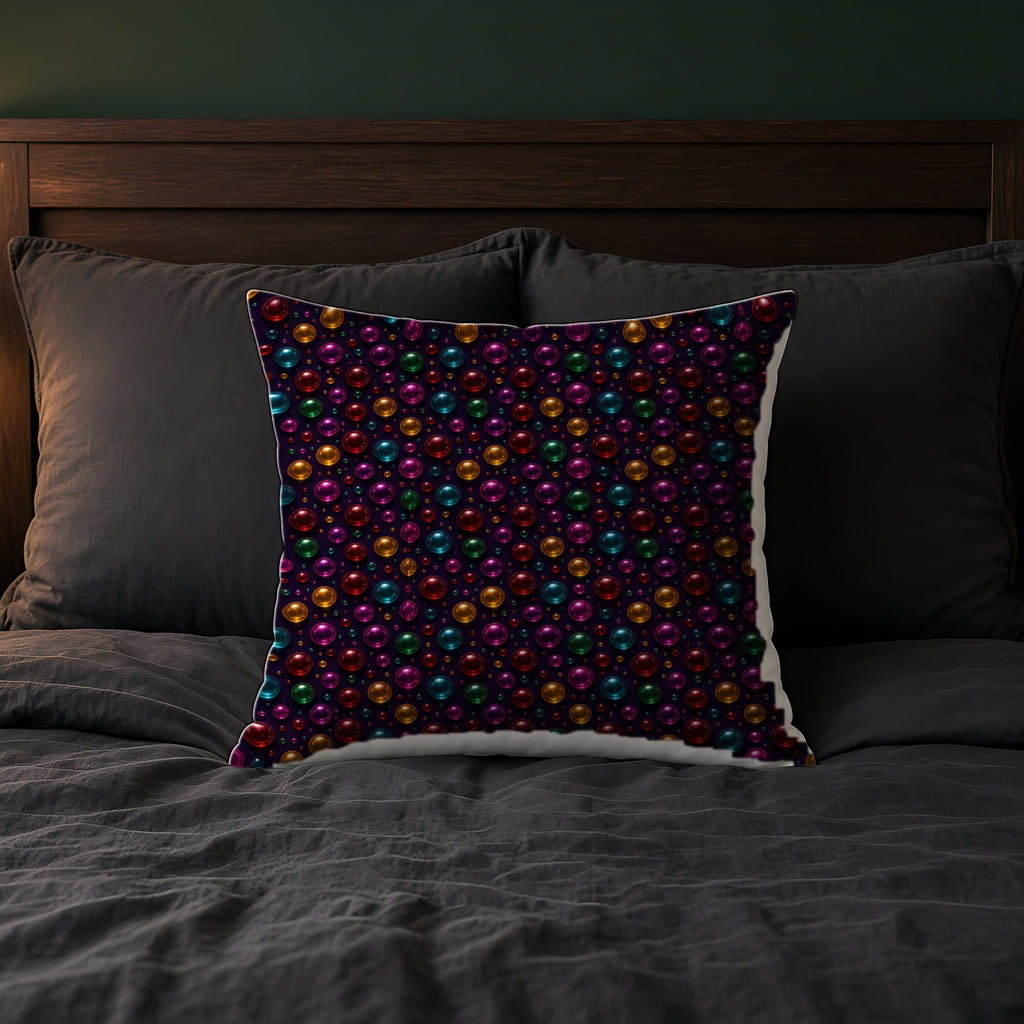 Gel Orb Confetti Faux Suede Cushion on a bed with charcoal bedding