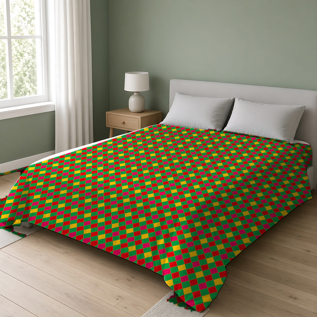 Jewel Harlequin Check Cotton Duvet Cover on a double bed in a bright sage-green bedroom