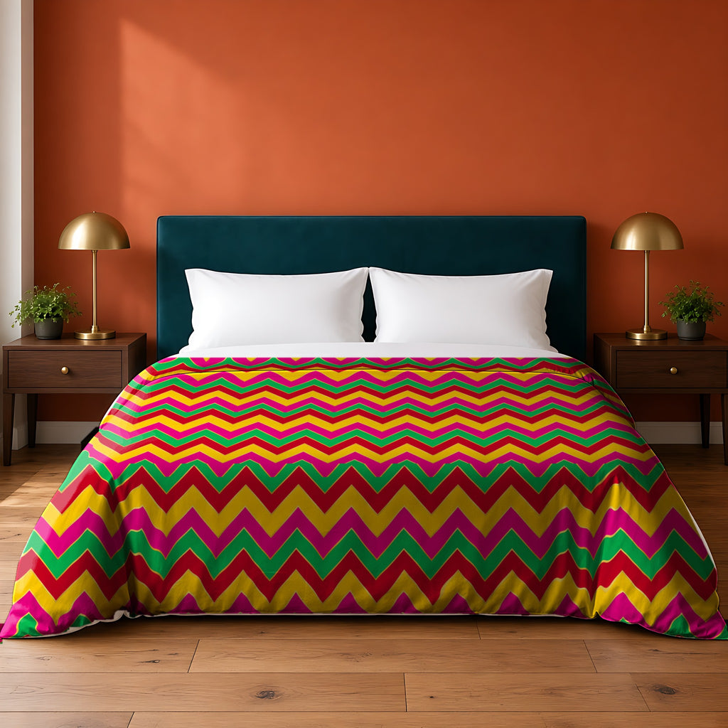 Jewel Chevron Bands cotton duvet cover in the Festive Jewel Bright palette, on a bed with a teal headboard against a terracotta wall
