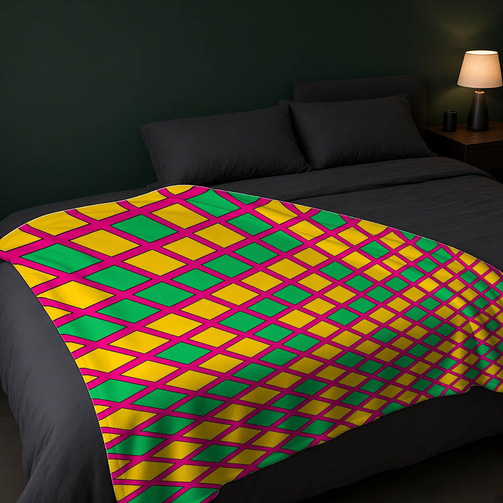 Harlequin Gold Grid Sherpa Fleece Blanket across the foot of a dark bed