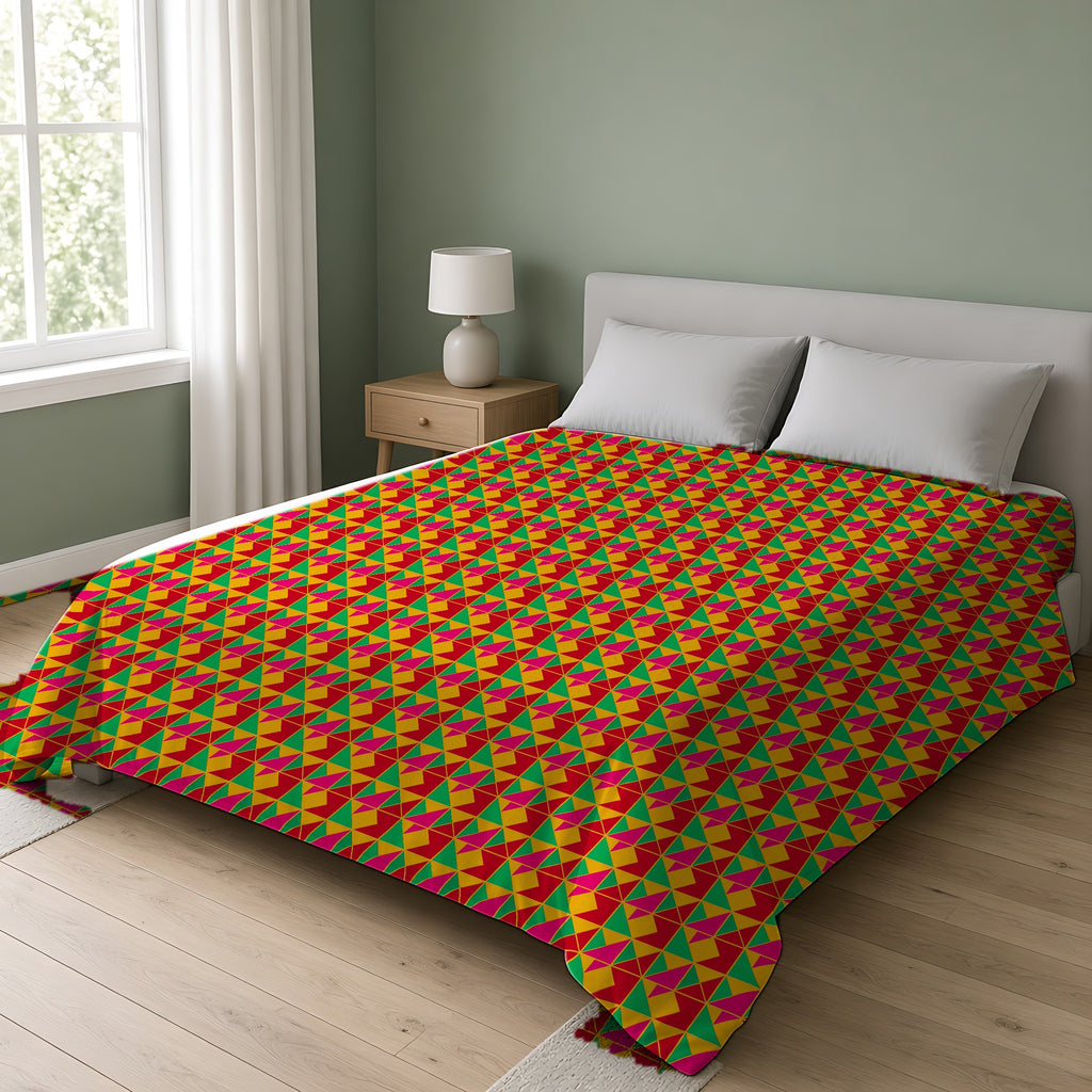 Jewel Block Quilt Cotton Duvet Cover on a double bed in a bright sage-green bedroom