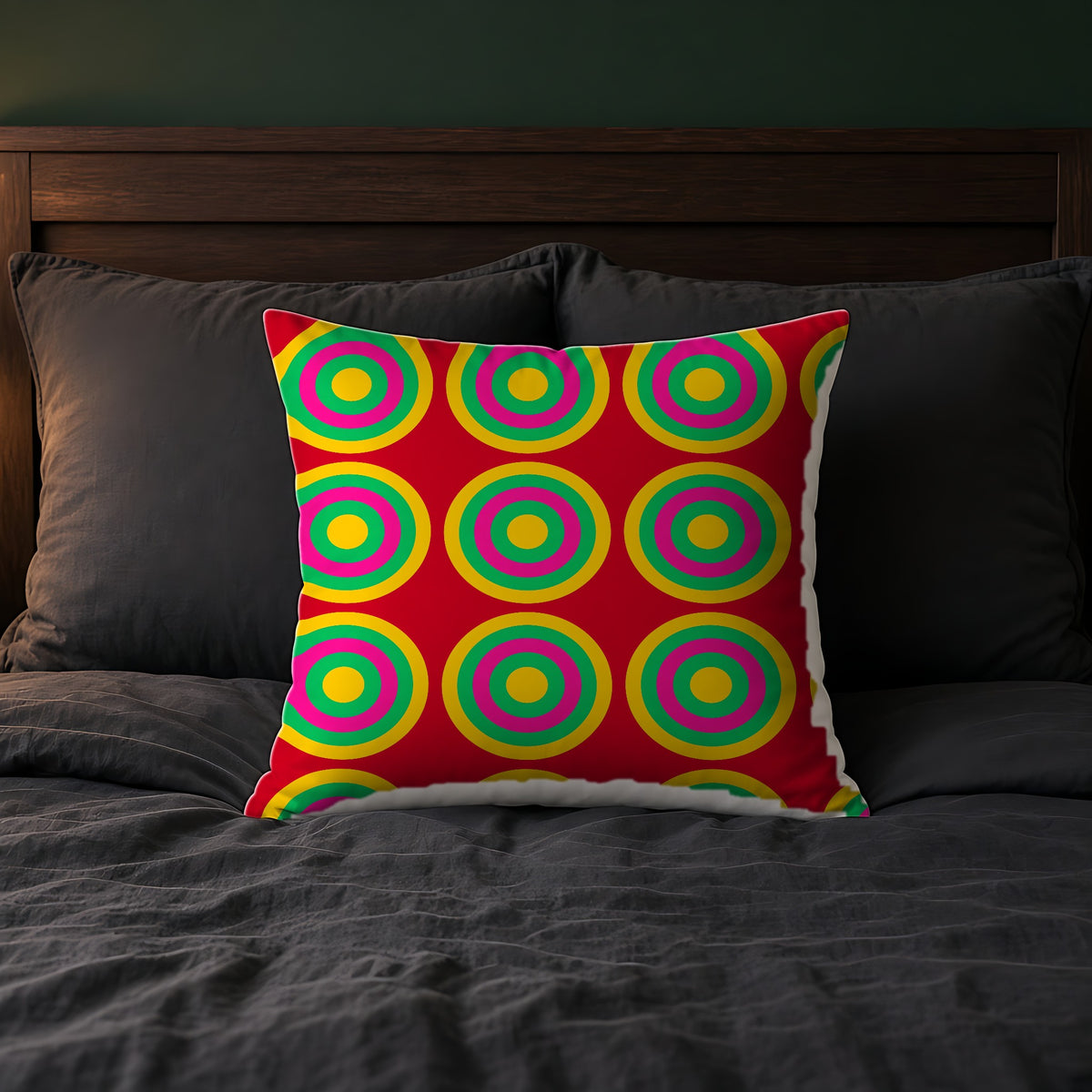 Mega Ring Grid Faux Suede Cushion on a bed with charcoal bedding