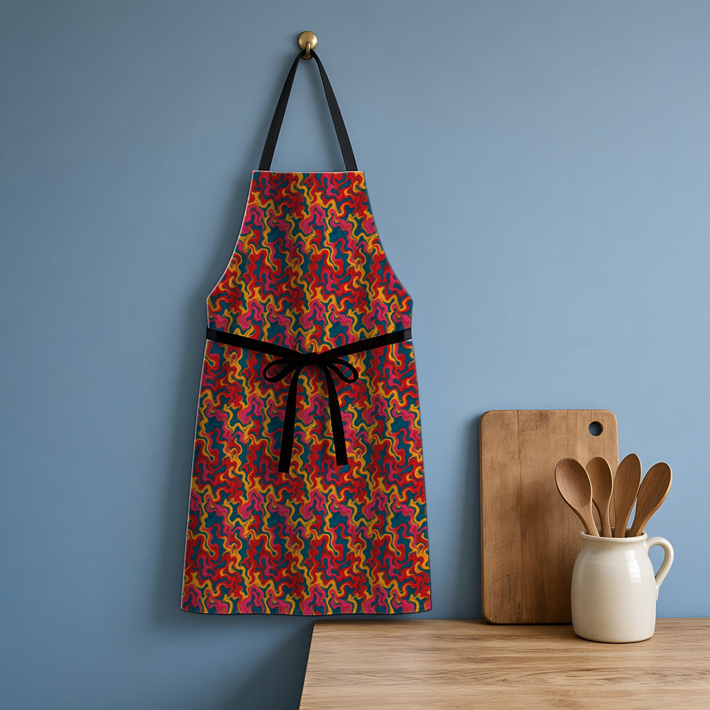 Ripple Thread Drift Apron hanging in a blue kitchen