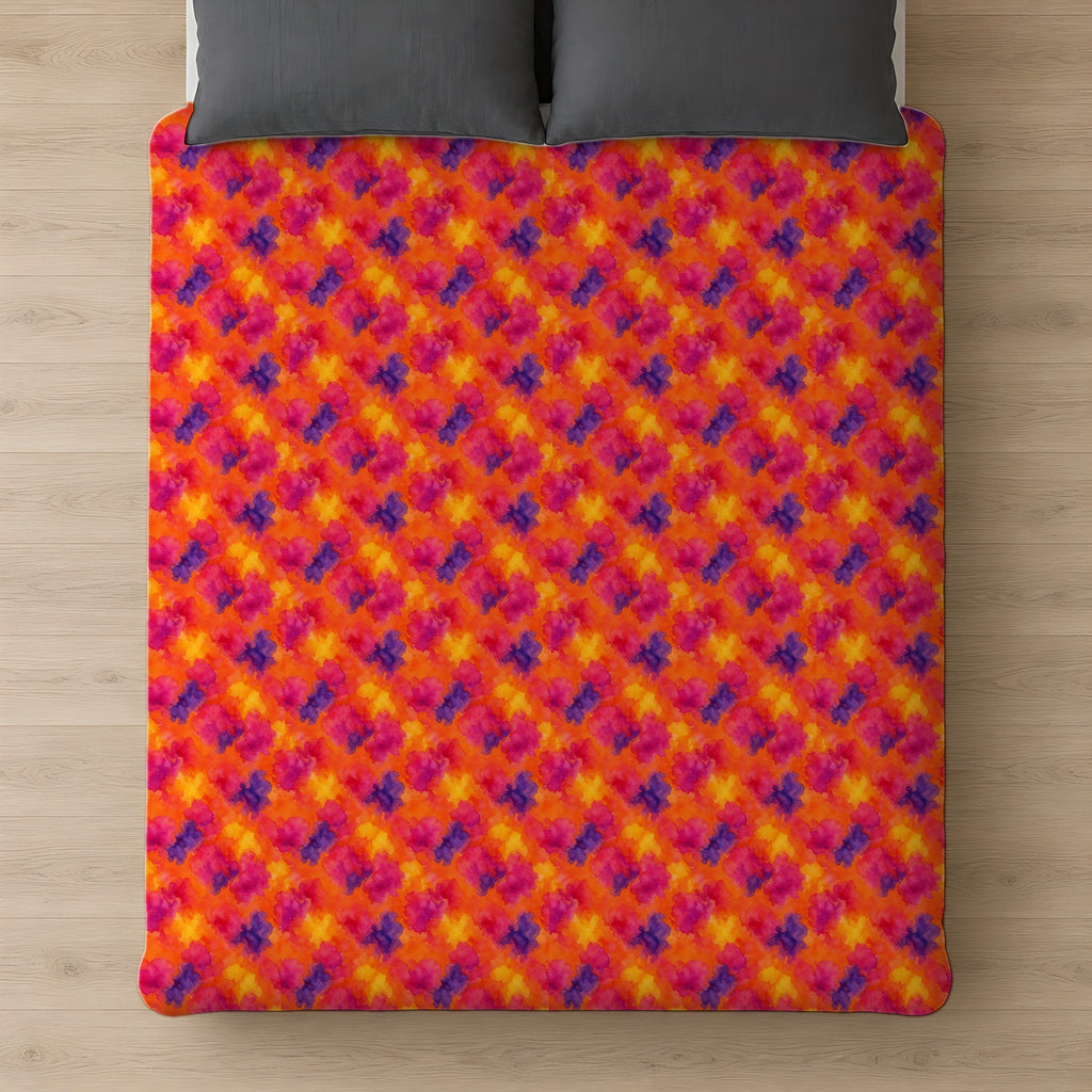 Sunset Bloom Bleeds Cotton Duvet Cover on a bed, seen from above