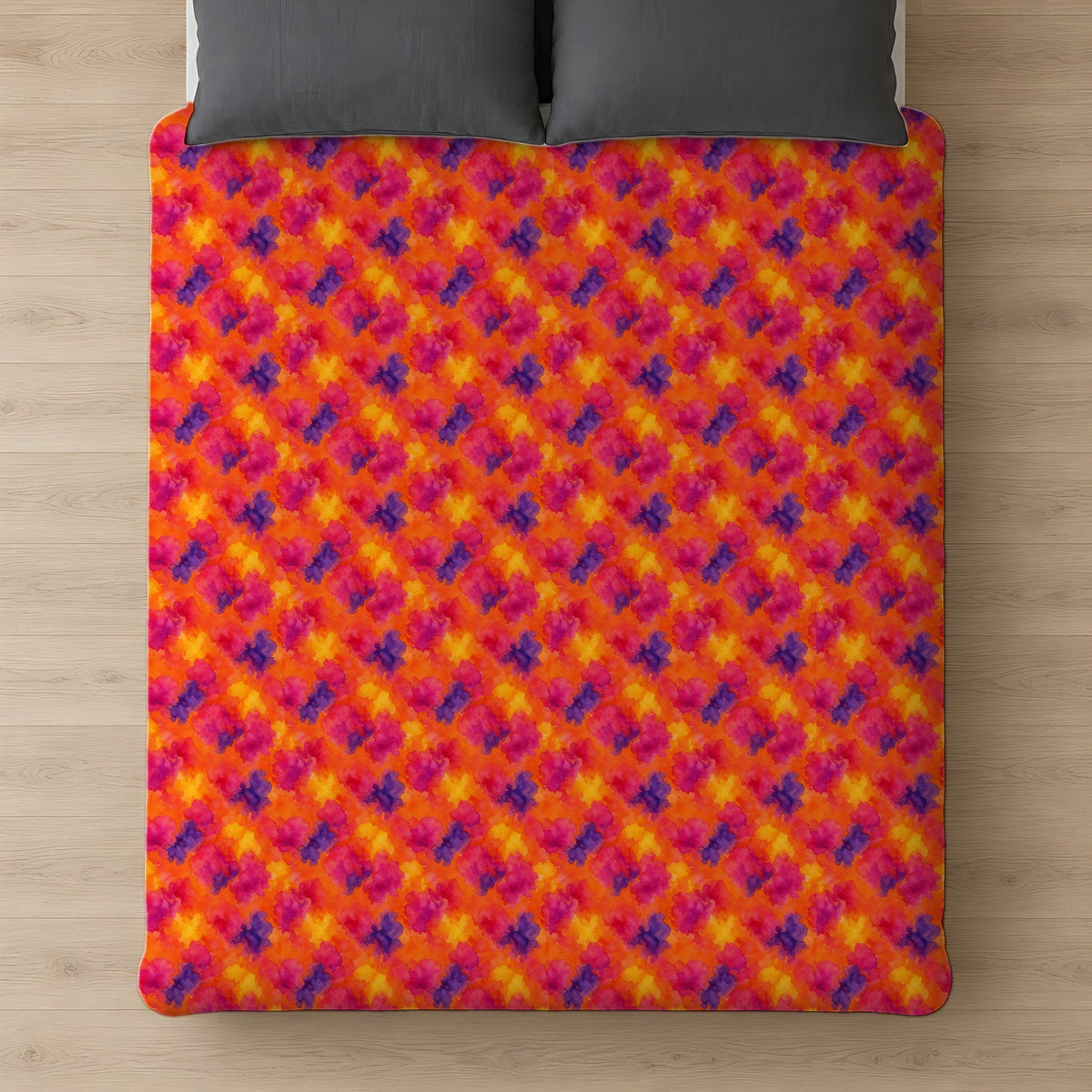 Sunset Bloom Bleeds Cotton Duvet Cover on a bed, seen from above