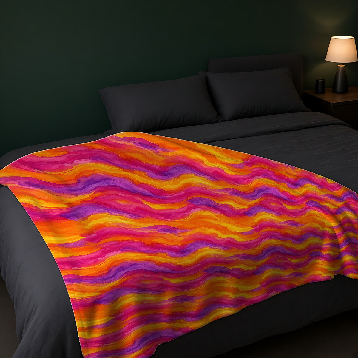Ombre Wash Bands Sherpa Fleece Blanket across the foot of a dark bed