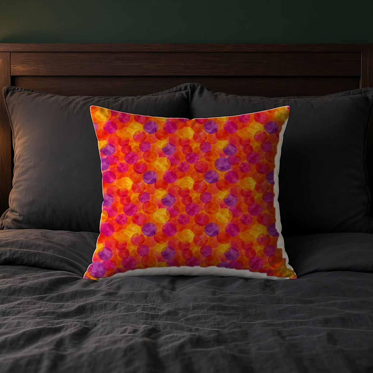 Glaze Circle Overlaps Faux Suede Cushion on a bed with charcoal bedding