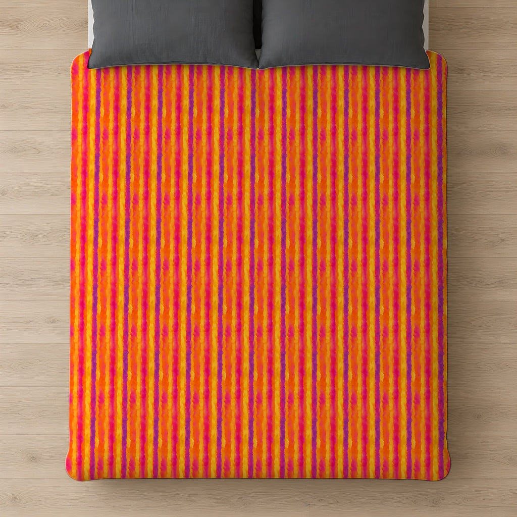 Bleed Stripe Ombre Cotton Duvet Cover on a bed, seen from above