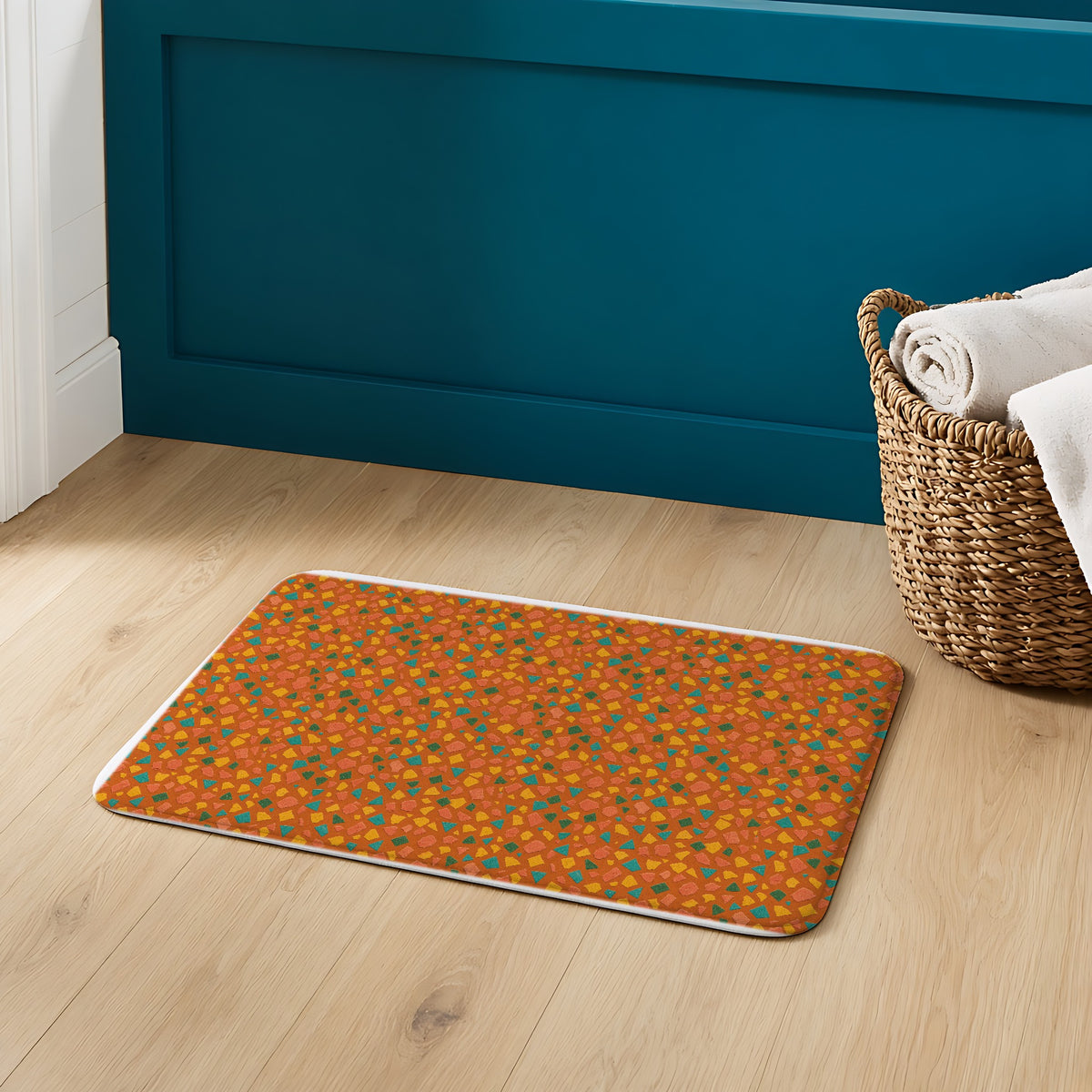 Angular Shard Scatter Bath Mat on an oak floor in a teal bathroom