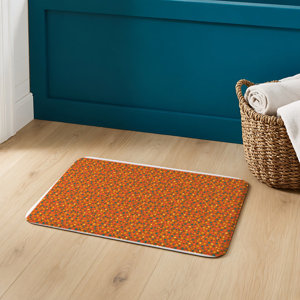 Confetti Aggregate Bath Mat on an oak floor in a teal bathroom