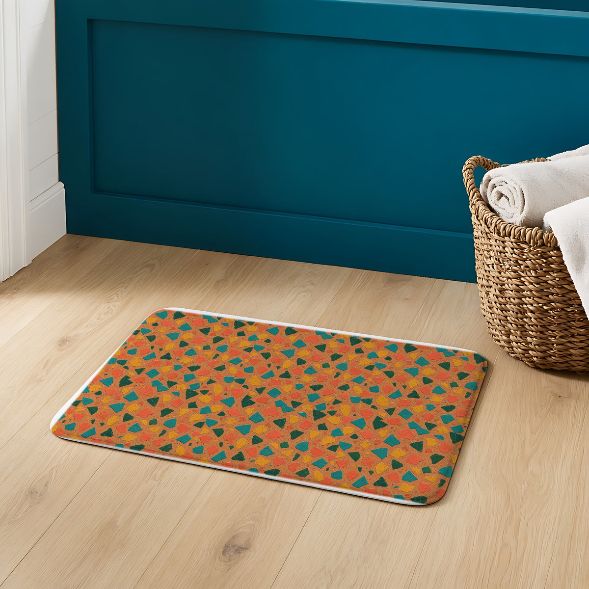 Shattered Tile Shards Bath Mat on an oak floor in a teal bathroom