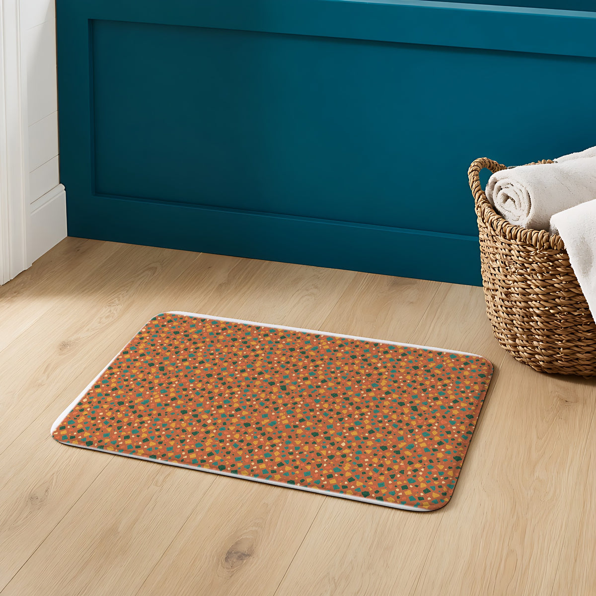 Jewel Chip Terrazzo Bath Mat on an oak floor in a teal bathroom