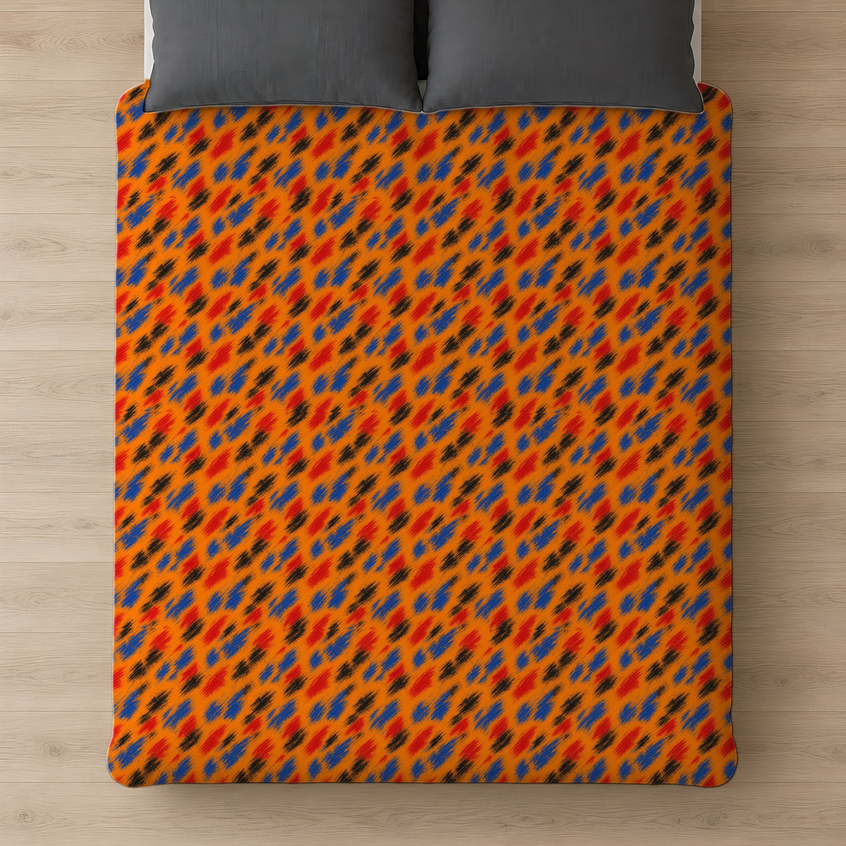 Dry-Brush Drags Comforter on a bed, seen from above